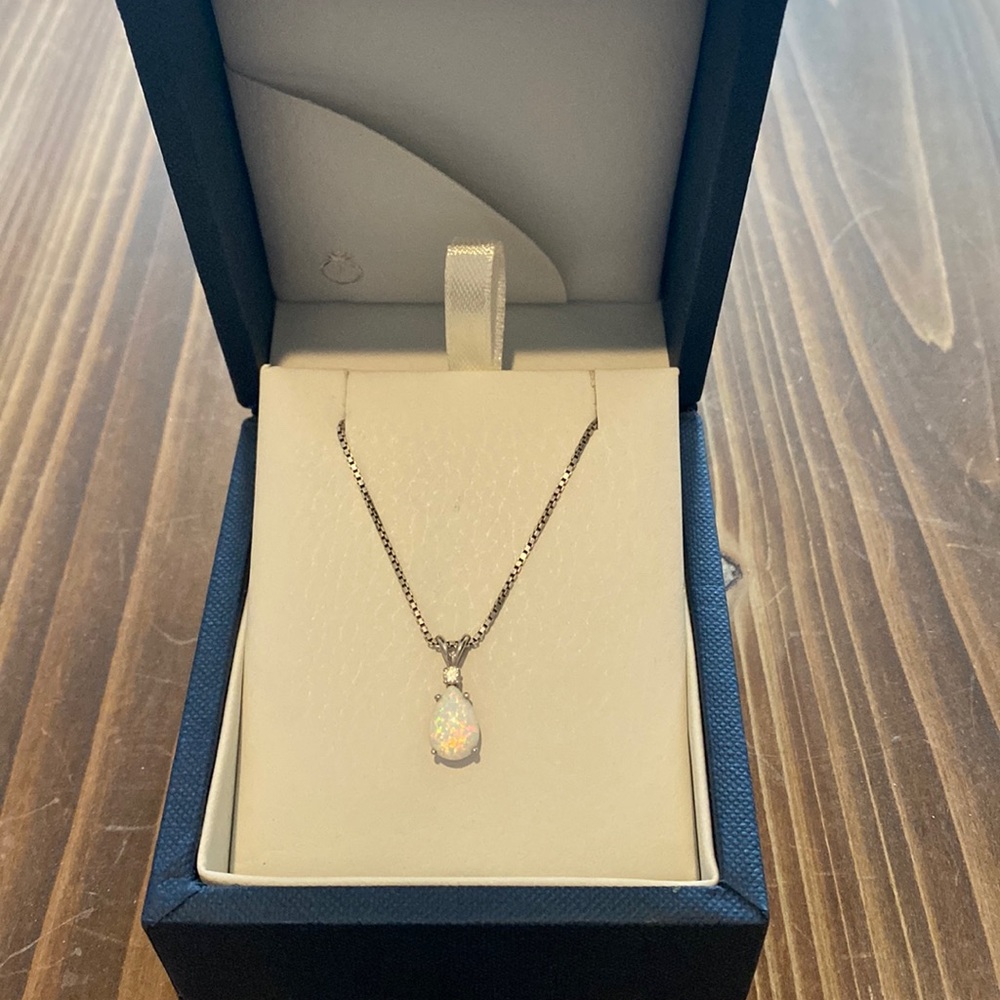 Peora, 14k white gold pear shaped opal diamond pendant